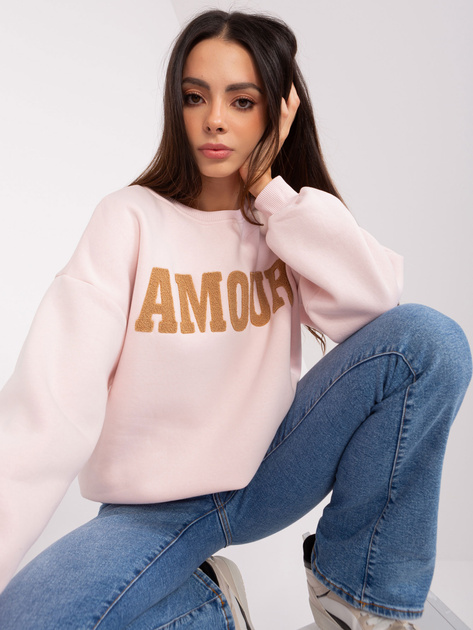Hurtownia Jasnoróżowa bluza bez kaptura z napisem