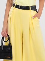 Pastelowe żółte spodnie z szeroką nogawką RUE PARIS 