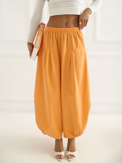 Jasnopomarańczowe sztruksowe spodnie z nogawką 7/8