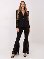 Black blazer with bell sleeves.