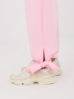 Jasnoróżowe dresowe spodnie z kokardkami