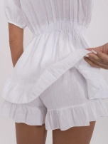 Biały muślinowy kombinezon z gumką w pasie