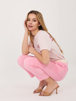 Różowe damskie spodnie cigarette z sztruksu 