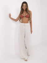 Jasnobeżowe spodnie palazzo bez zapięcia