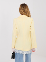 Pastelowa żółta elegancka marynarka z zapięciem na guzik