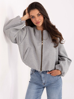 Gray balloon jacket with pockets.