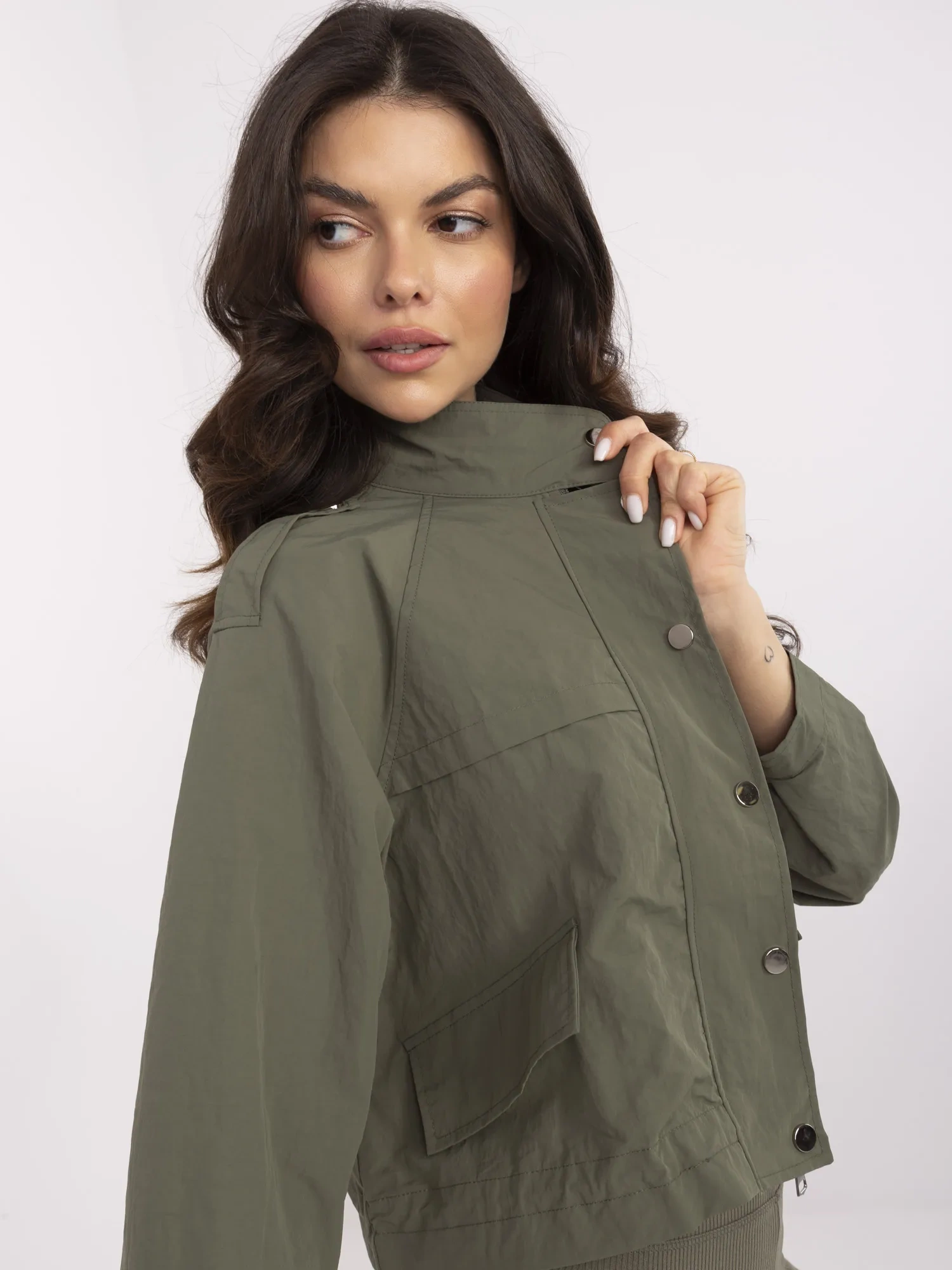 Khaki short windbreaker jacket without a hood.