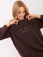 Dark brown cotton blouse with a ribbed cuff.