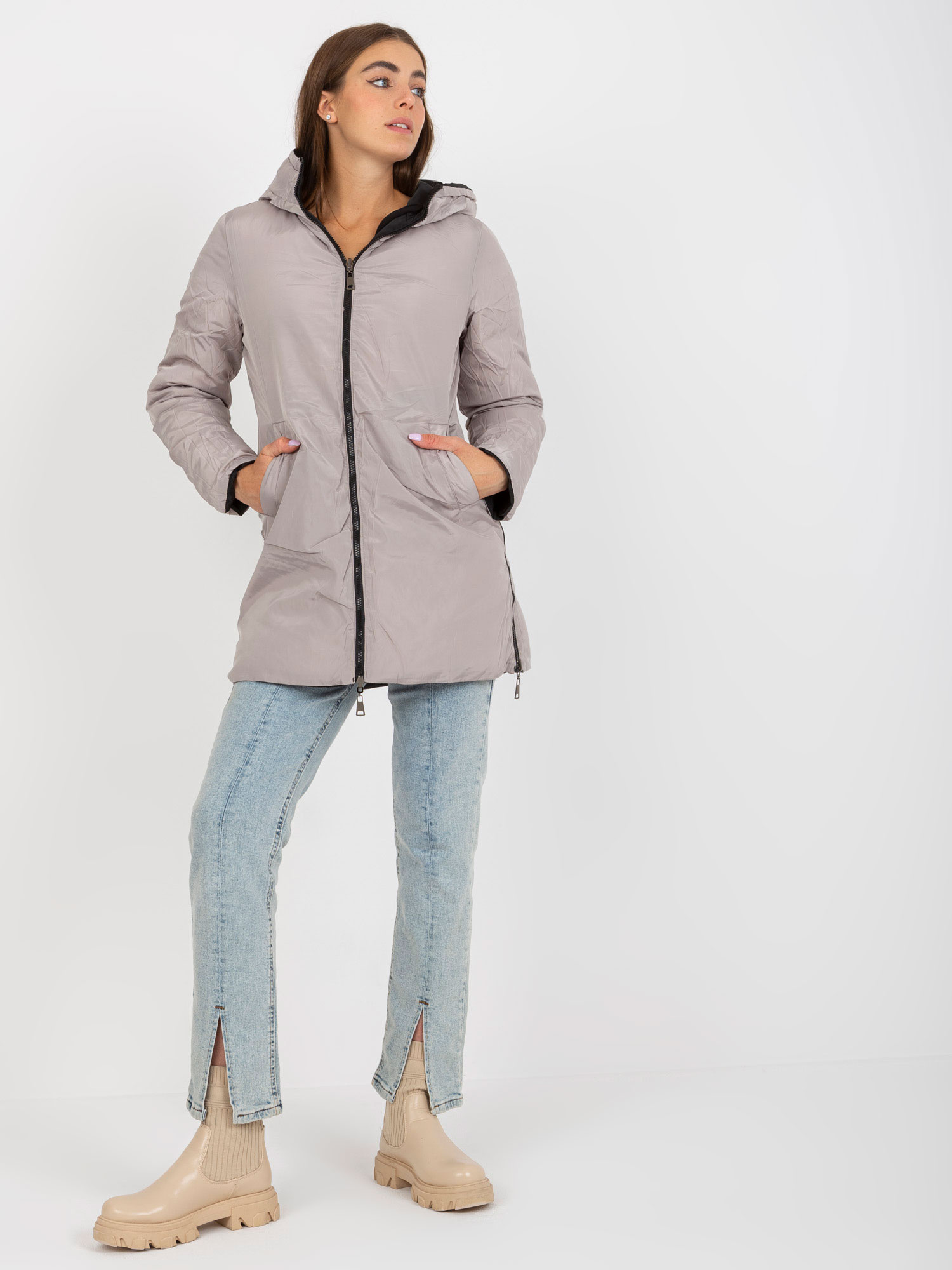 Hurt schwarz-beige wendbare Winterjacke mit Kapuze.