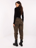 Women's khaki pants with 7/8 length leg.