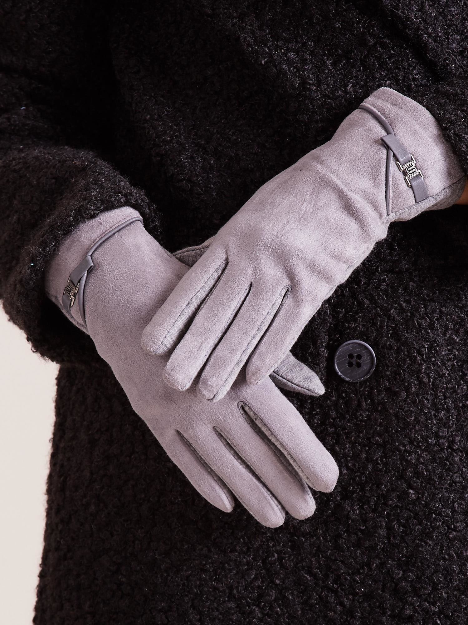 Graue elegante Damenhandschuhe.