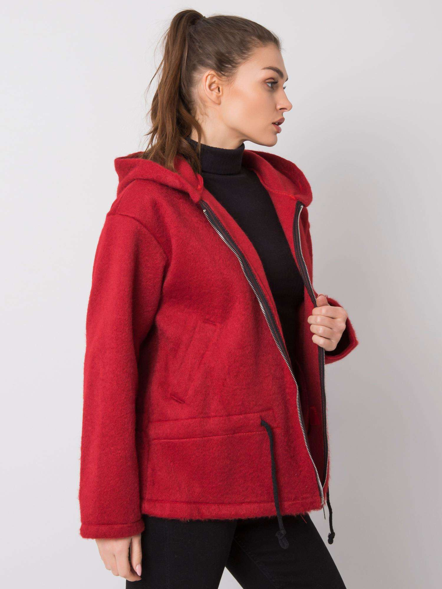 Audrey's burgundy coat