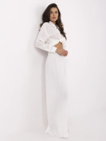 White pleated wide-leg pants.