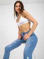 Hurtownia Niebieskie jeansowe rurki z printem