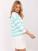 Hurtownia Miętowo-ecru bluzka z kwiatami na rękawach