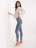 Hurt Niebieskie dopasowane jeansy z ozdobnymi guzikami