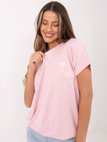 Jasnoróżowa damska bluzka oversize z krótkim rękawem