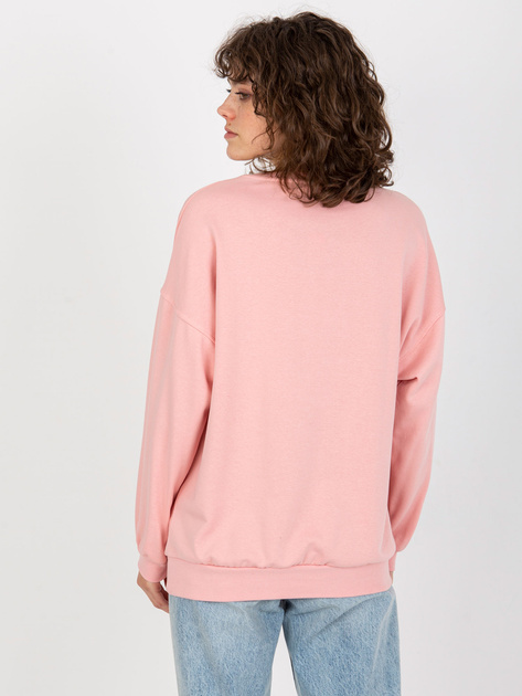 Hurtownia Jasnoróżowa luźna bluza bez kaptura z napisem