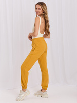 Helle orange Jogginghose mit Taschen RUE PARIS.