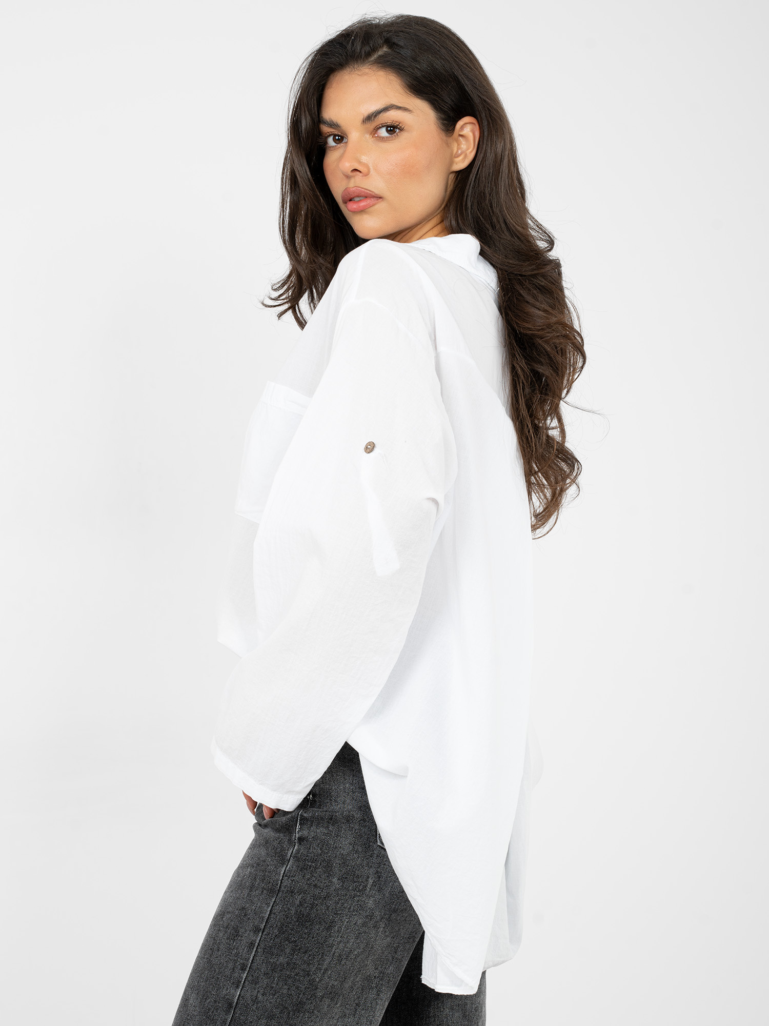 White women's shirt with a longer back.