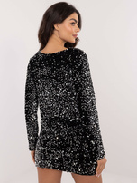 Schwarz-silberne Paillettenjacke mit Schleifen.