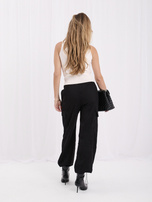 Black corduroy pants with side pockets.