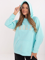 Miętowa dresowa bluza oversize z napisem RUE PARIS 