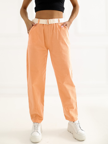 Jasnopomarańczowe sztruksowe spodnie z kieszeniami