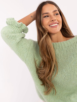Hurtownia Pistacjowy sweter falbankami przy rękawach