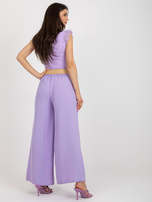 Hurtownia Jasnofioletowe zwiewne spodnie z materiału