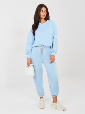Jasnoniebieskie dresowe spodnie ze ściągaczami 