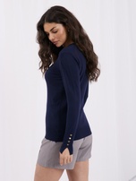 Dunkelblauer Damenpullover mit dekorativen Bündchen.
