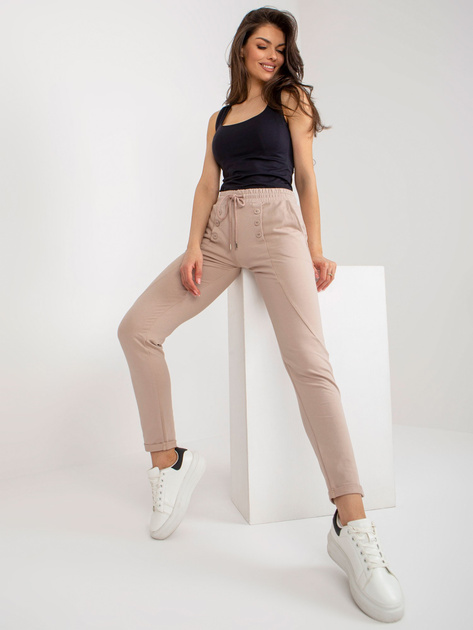 Hurt Beżowe damskie spodnie dresowe z prostą nogawką