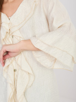 Jasnobeżowa damska koszula z marszczonego materiału 