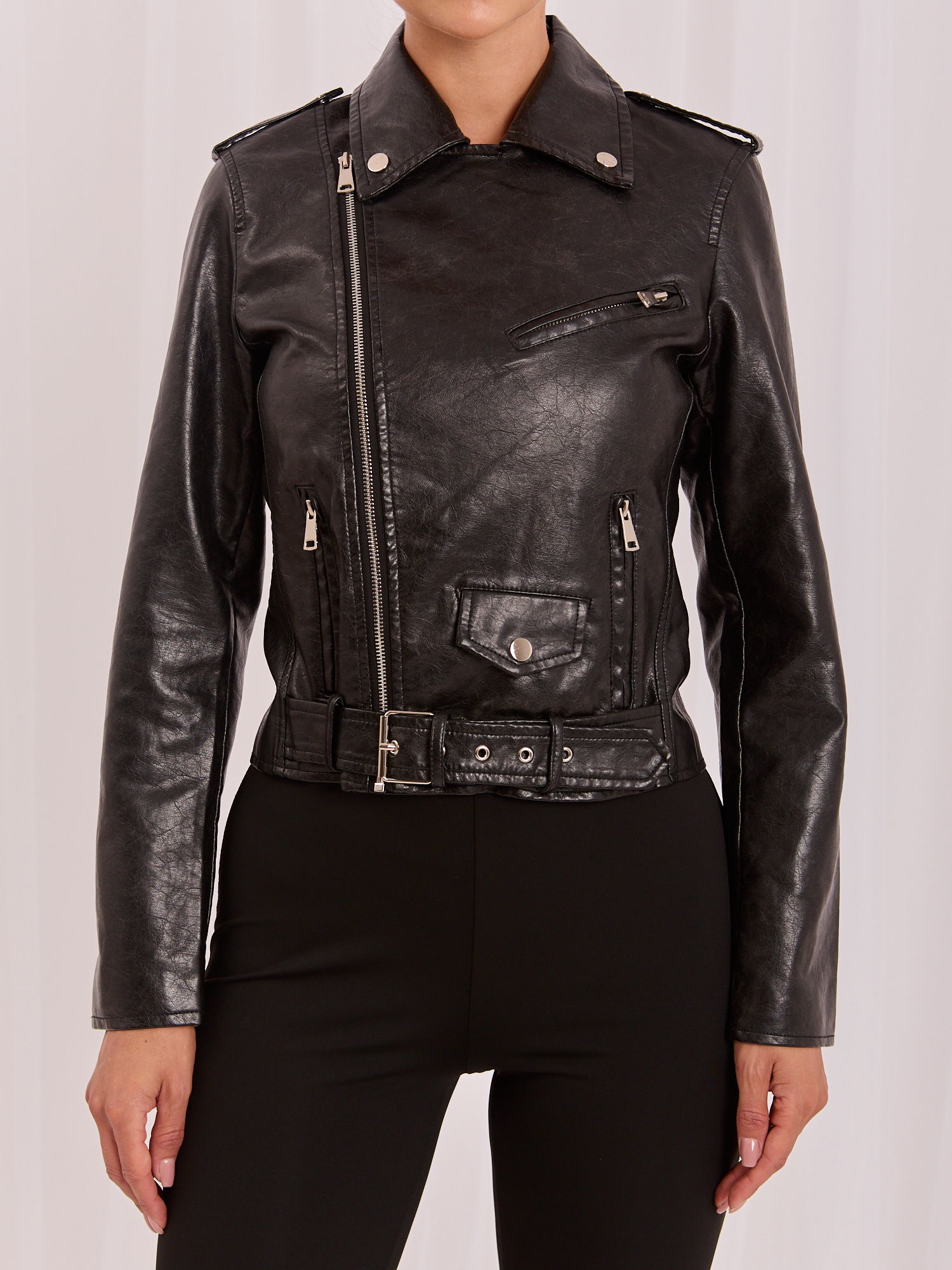 Black women's biker jacket with a belt.