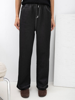 Black sweatpants with a denim effect.