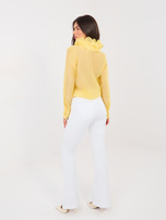 Białe jeansowe spodnie dzwony  