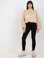 Hurt Czarne legginsy casualowe z napisami po bokach 