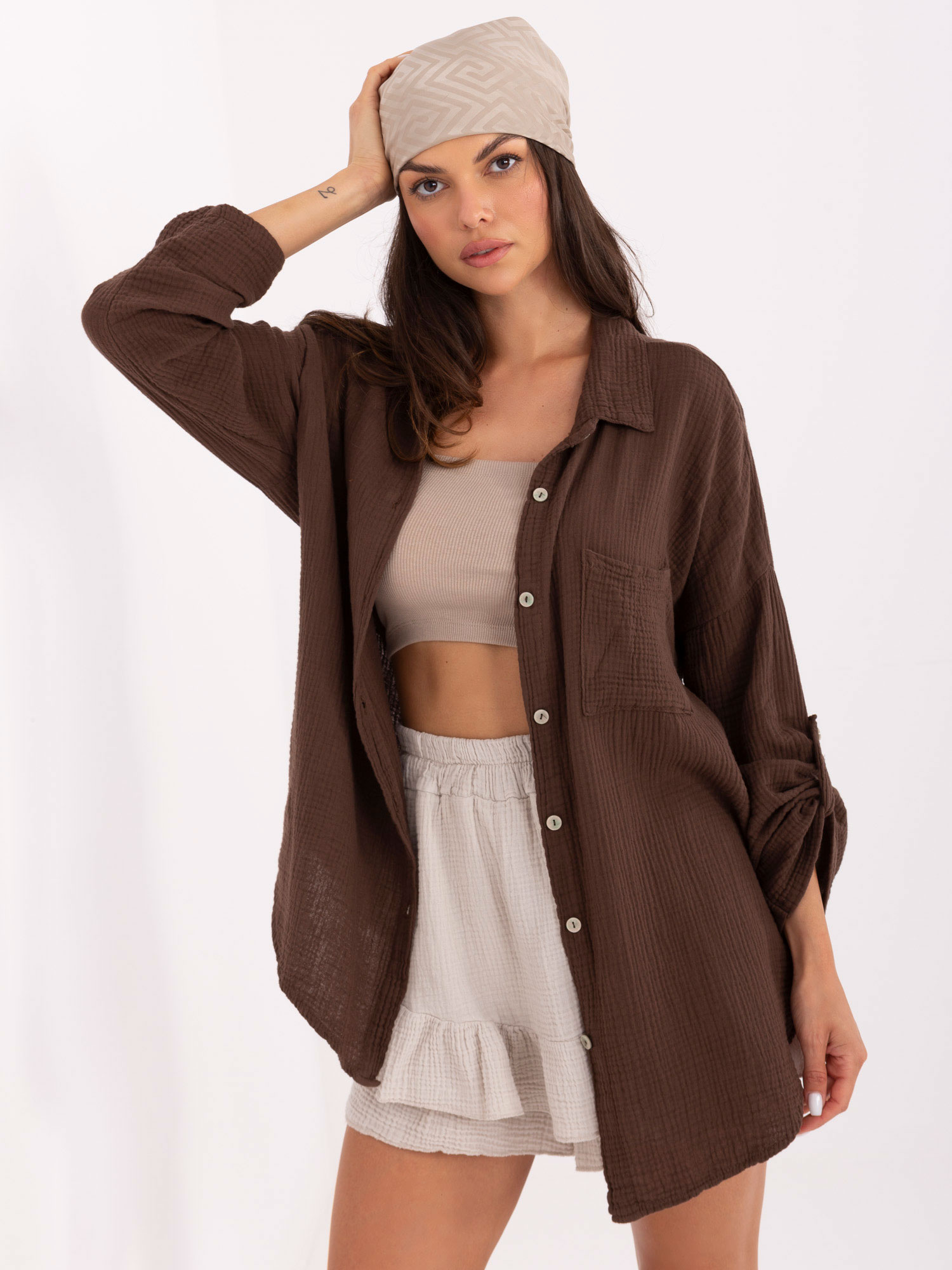 Dark brown oversized muslin shirt.