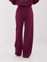 Burgundowe dresowe spodnie z przeszyciami