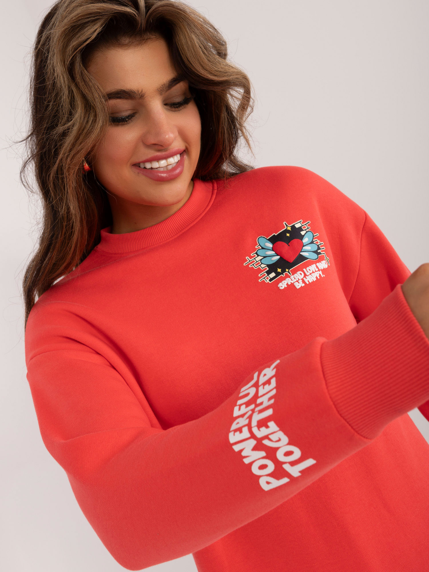 Coral women's cotton sweatshirt with SUBLEVEL print.