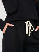 Czarne dresowe spodnie z wiązanymi nogawkami