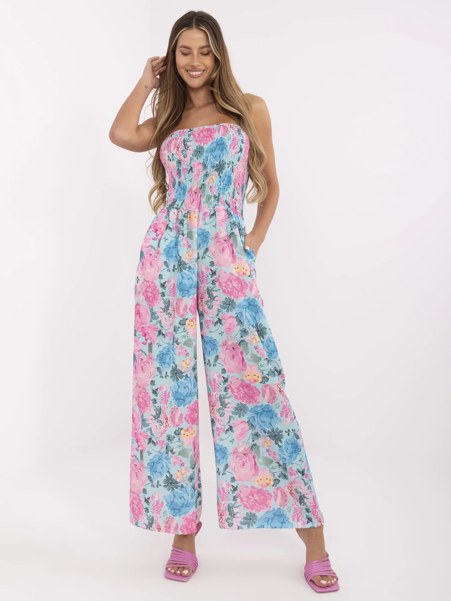 Mint-pink women's jumpsuit with flowers.