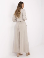 Beżowe muślinowe spodnie z szeroką nogawką