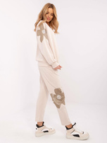 Hurt Beżowy damski komplet ze wstawkami w kwiaty