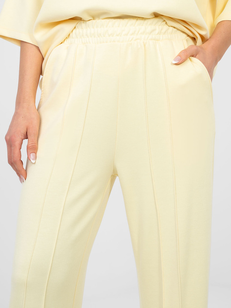 Pastelowe żółte spodnie wide leg z wysokim stanem RUE PARIS