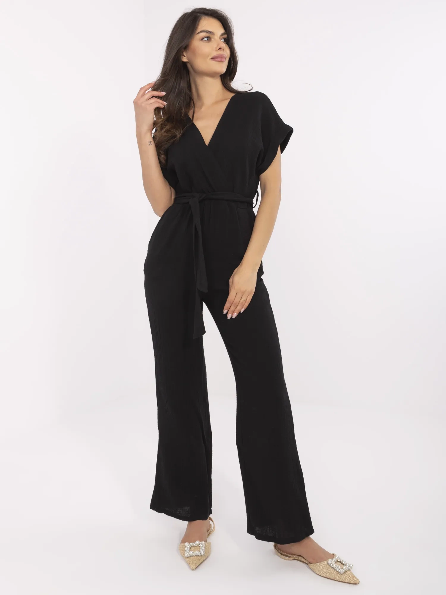 Black muslin jumpsuit with pockets.