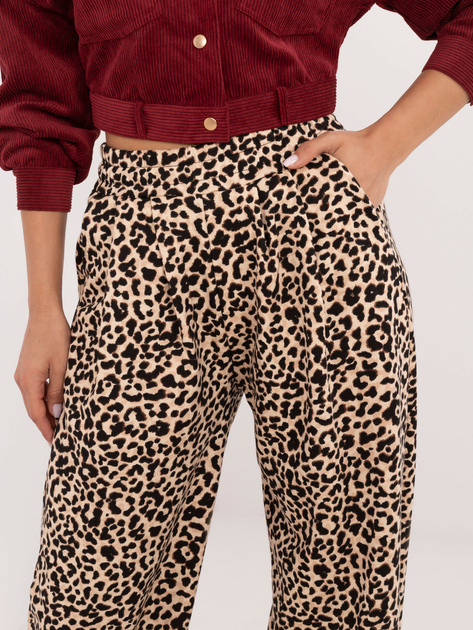 Hurtownia Beżowo-czarne długie spodnie w panterkę