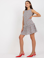 Biało-czarna sukienka z printami i falbaną 