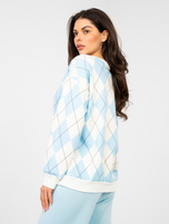 Pastelowa niebieska bluza w geometryczne wzory